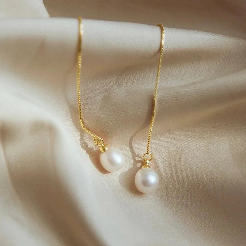 Boucles d'Oreilles Pendantes Perle Dorée – Élégance & Féminité – Alliage de cuivre, perle simulée